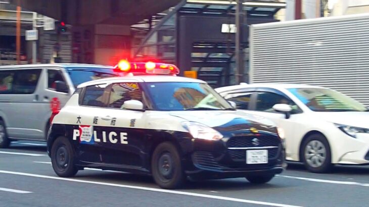 扇町通を緊急走行するミニパトカー | 大阪府警察