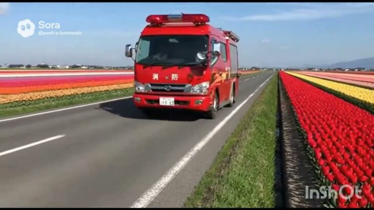 【AI生成】消防車が春の景色を走ります　[AI-generated] A fire truck drives through a spring landscape.