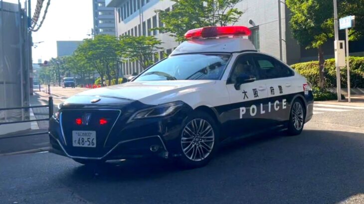 北野病院前を緊急走行するパトカー | 大阪府警察