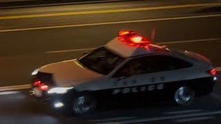 パトカー　緊急走行