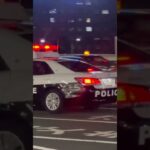 新大阪駅前を緊急走行する 大阪府警察210系パトカー